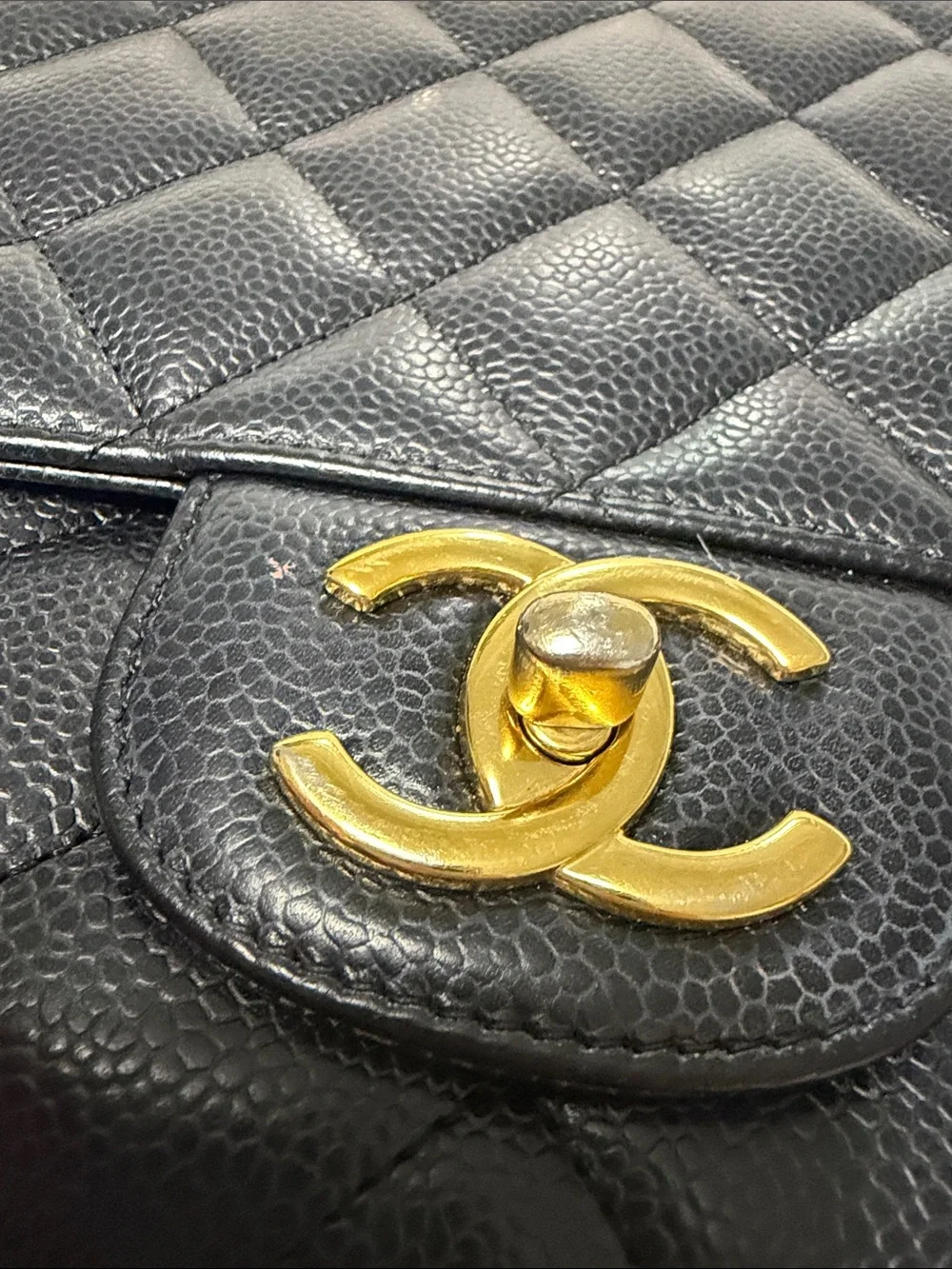 CHANEL Black Quilted Shoulder Bag with Gold Hardware